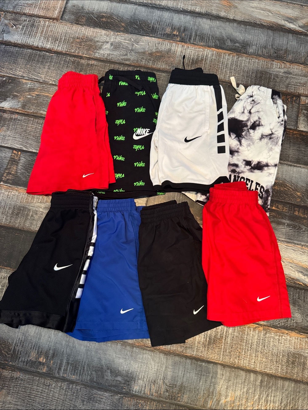 8 pairs of size medium Nike boys athletic shorts